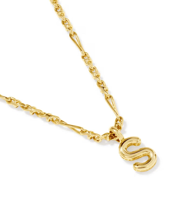 A gold chain necklace featuring a polished, stylized capital letter 'S' pendant, displayed on a clean white background.