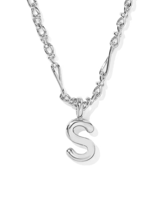 A silver initial necklace featuring a polished lowercase letter 's' pendant on a matching chain, shown against a clean white background.