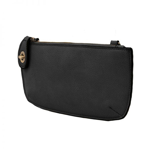 Black handbag with a gold clasp on a white background