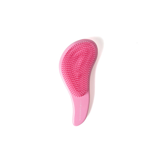 Pink silicone scrubber on a white background