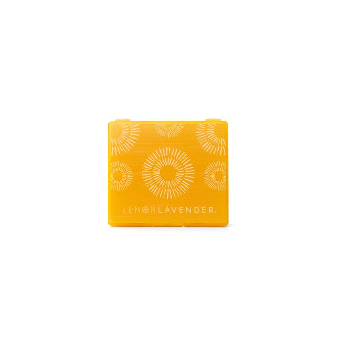Yellow soap bar with circular patterns and 'Lemon Lavender' text on a white background