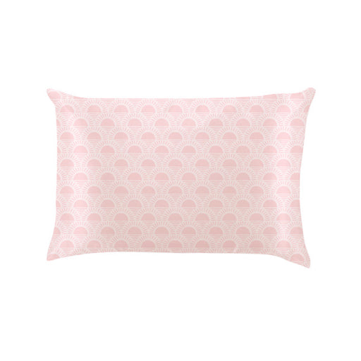 Pink pillow with a geometric pattern on a white background