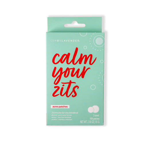 Pack of acne patches with 'calm your zits' text on a light green background