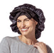 Woman wearing a black satin bonnet on a white background