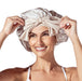 Woman wearing a beige satin bonnet on a white background