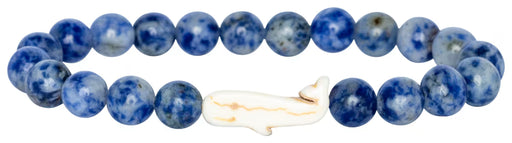 Blue beaded bracelet with a white fish charm on a white background