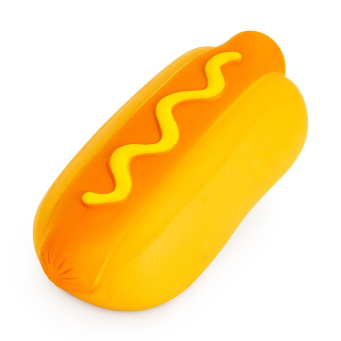 Toy hot dog with mustard on a white background