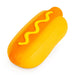 Toy hot dog with mustard on a white background