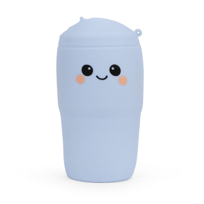 Blue squishy object with a smiley face on a white background