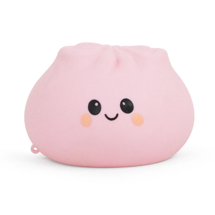 Dumpling-shaped toy on a white background