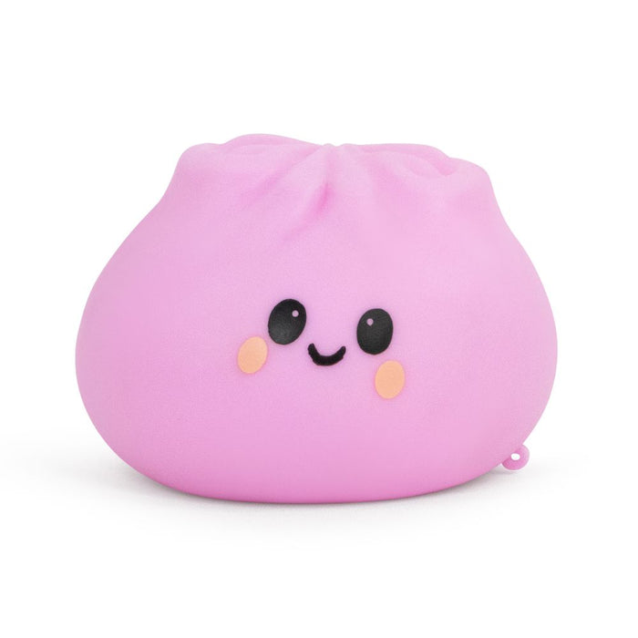 Pink plush toy with a smiling face on a white background