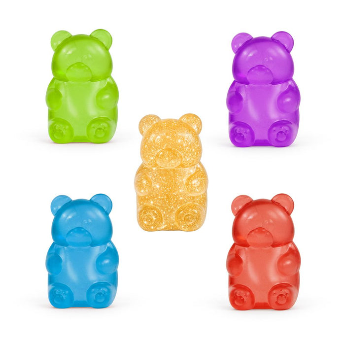 Five colorful gummy bear toys on a white background