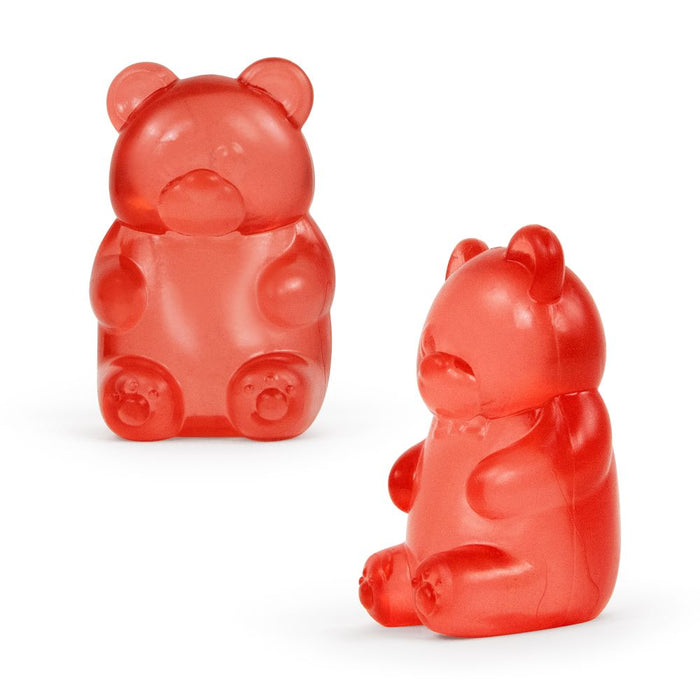 Two red gummy bears on a white background