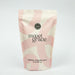 Bag of sweet grace mineral soaking salts with pink and beige design on a white background