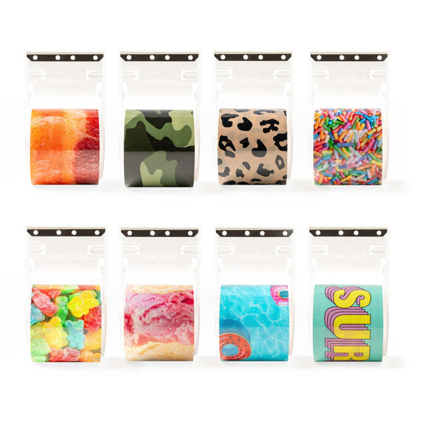 Assorted colorful tape rolls in various patterns on a white background