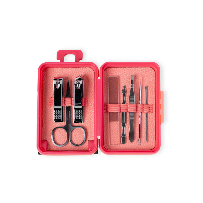 Manicure set with scissors, clippers, and tweezers in a pink case on a white background