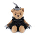 Teddy bear dressed as a witch with a black dress and hat on a white background