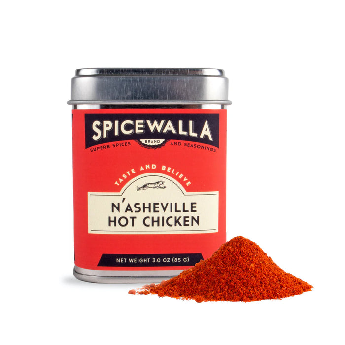 Spicewalla N’asheville Hot Chicken spice can with red spice powder on a white background