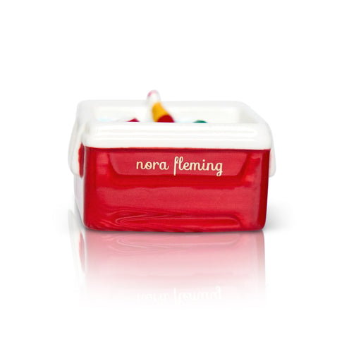 Red vintage ice box cooler with 'Nora Fleming' branding