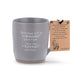 Gray mug with text and a tag on a white background