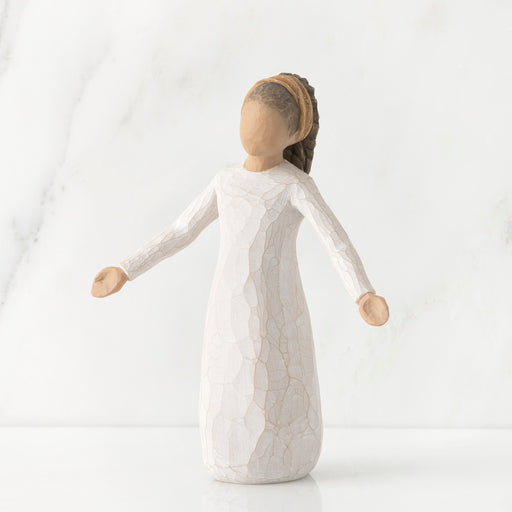 White ceramic figurine on a white background