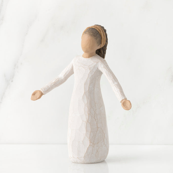 White ceramic figurine on a white background