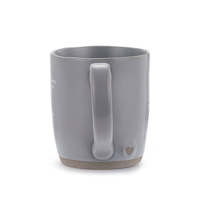 Gray mug with a heart design on a white background