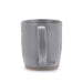 Gray mug with a heart design on a white background