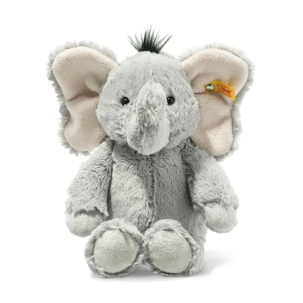 Plush elephant toy with a visible brand tag on a white background