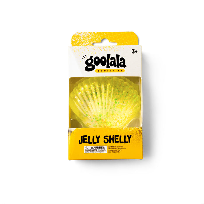 Goolala Jelly Shelly toy in its original retail packaging, featuring a yellow jelly shell with green glitter inside a clear window box.
