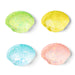 Four small scallop-shaped resin dishes with glittery speckles, arranged in a 2x2 grid on a white background. The colors are light green, pale yellow, light blue, and light pink.