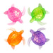 Four translucent turtle-shaped stress toys arranged in a 2x2 grid on a white background, featuring pink, green, orange, and purple shells with glittery textures.