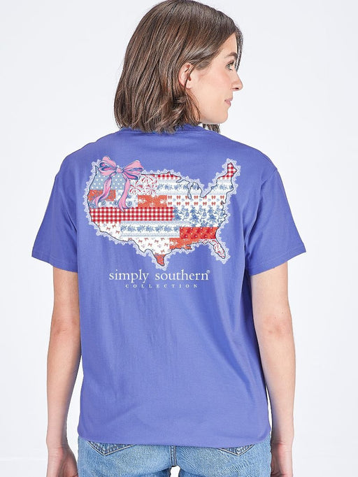 Woman wearing a purple 'Simply Southern' t-shirt with a graphic design on the back.