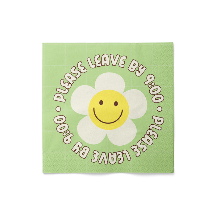 Napkin with a smiley face flower and text on a green background