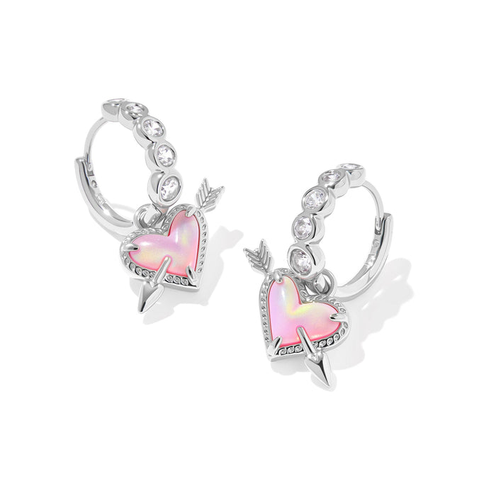 Pair of hoop earrings with pink heart and lightning bolt designs on a white background
