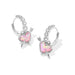 Pair of hoop earrings with pink heart and lightning bolt designs on a white background