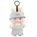Plush toy with a hat and overalls on a white background