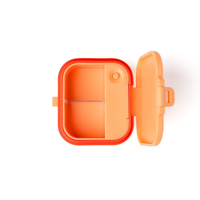 Orange plastic container with a lid on a white background