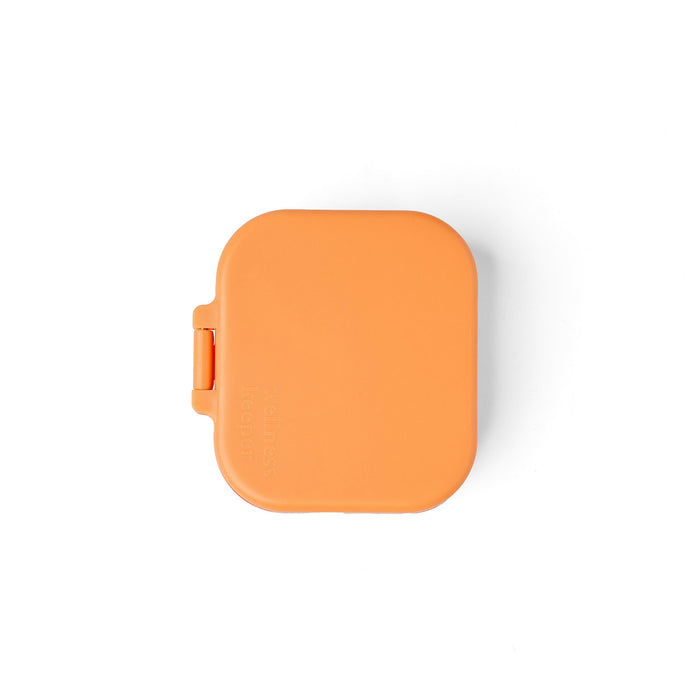 Orange square-shaped object on a white background