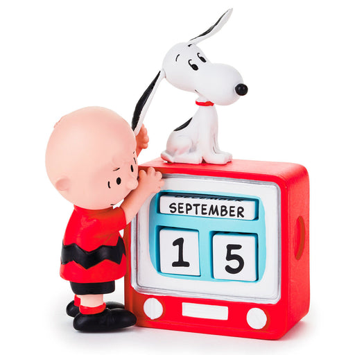 https://trudyshallmark.com/cdn/shop/products/Peanuts-Charlie-Brown-_-Snoopy-TV-Set-Perpetual-Calendar_1PAJ3514_01_512x512.jpg?v=1646699214